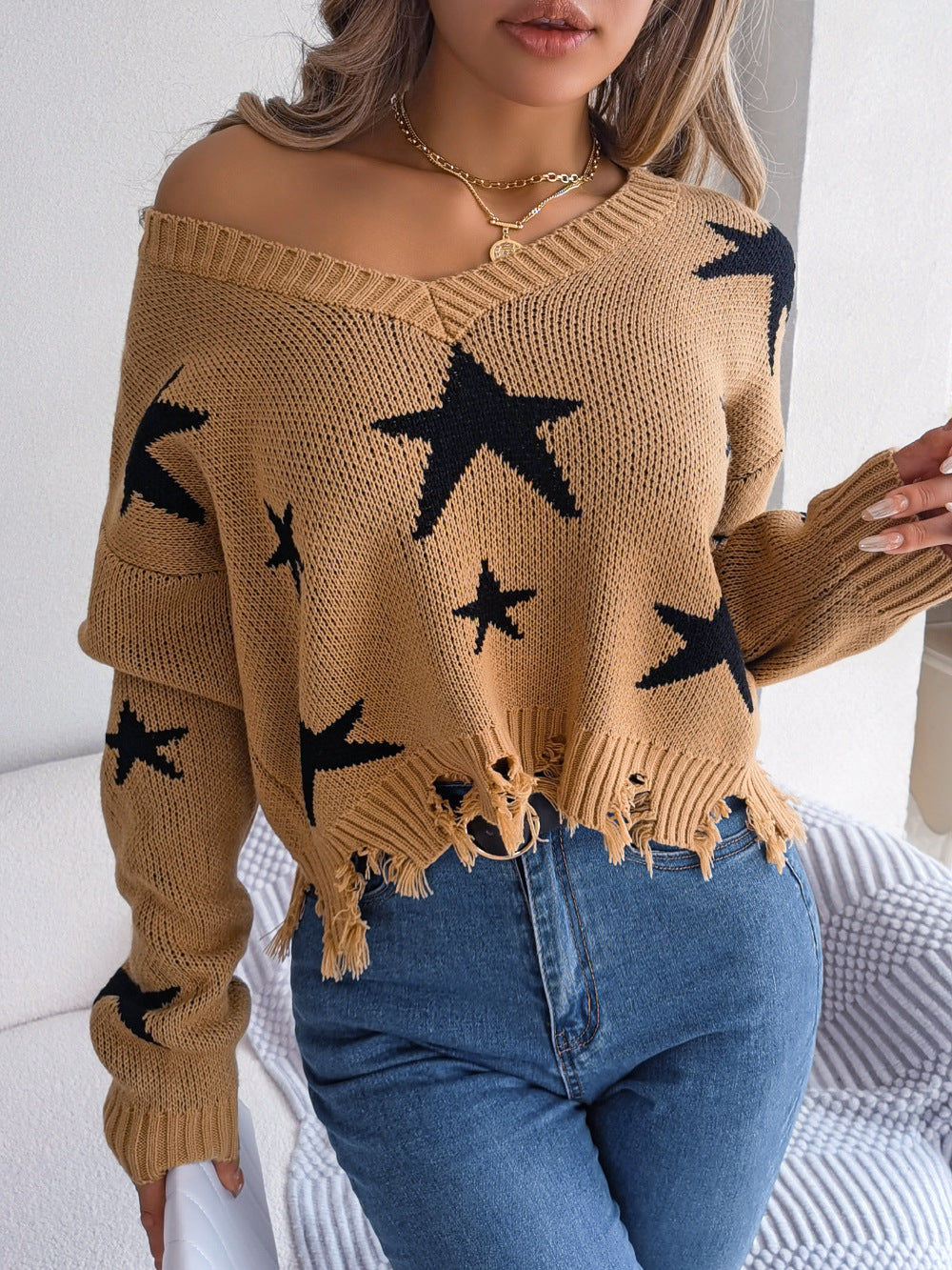 V-neck star cut long sleeved knitted pullover sweater